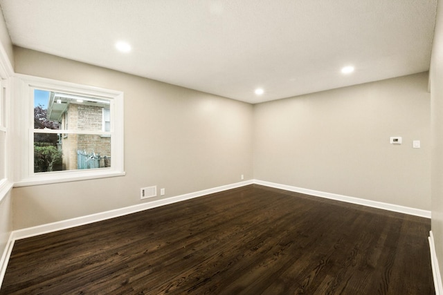 4506 W 77th Pl, Chicago, IL 60652 - spare room with dark wood-type flooring and recessed lighting