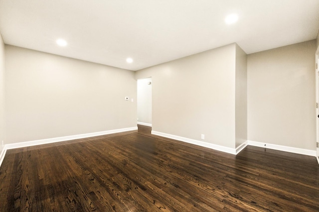4506 W 77th Pl, Chicago, IL 60652 - spare room featuring dark wood-type flooring and recessed lighting