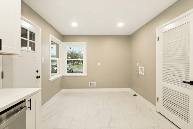 4506 W 77th Pl, Chicago, IL 60652 - laundry room featuring light marble finish flooring, washer hookup, recessed lighting, and cabinet space