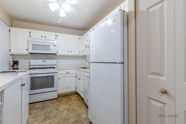 945 E Kenilworth Ave Unit 120, Palatine, IL 60074 - kitchen featuring white appliances, light countertops, white cabinets, and backsplash