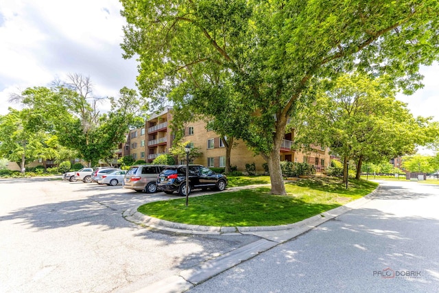 945 E Kenilworth Ave Unit 120, Palatine, IL 60074 - view of apartment building / complex with uncovered parking
