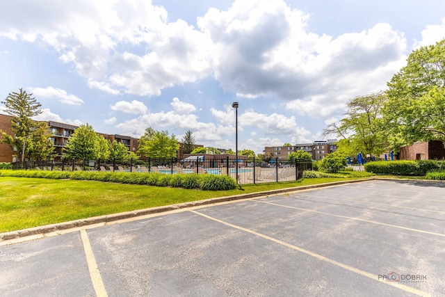 945 E Kenilworth Ave Unit 120, Palatine, IL 60074 - uncovered parking lot with a community pool
