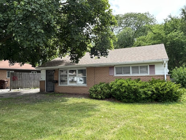 417 Shabbona Dr, Park Forest, IL 60466 - ranch-style house featuring brick siding and a shingled roof