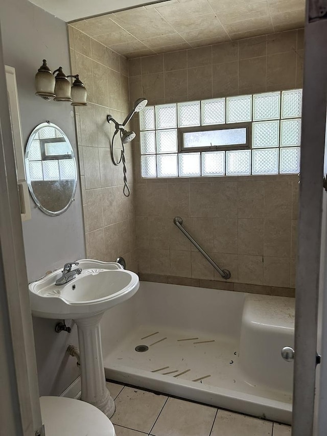 417 Shabbona Dr, Park Forest, IL 60466 - full bathroom with a tile shower, healthy amount of natural light, and tile patterned floors