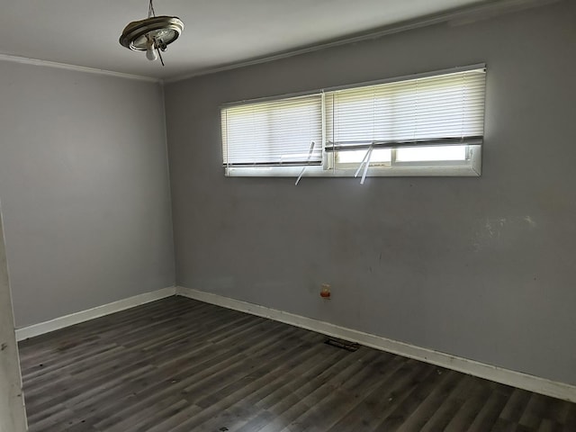 417 Shabbona Dr, Park Forest, IL 60466 - unfurnished room with healthy amount of natural light, crown molding, and dark wood-style flooring