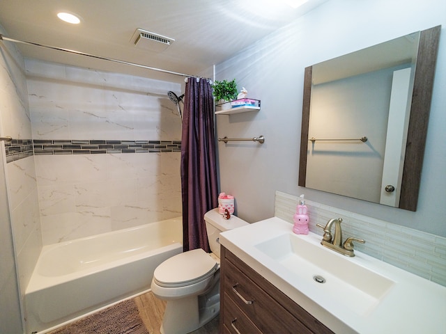 1215 Chalet Rd Unit 200, Naperville, IL 60563 - bathroom featuring shower / tub combo with curtain, vanity, and tasteful backsplash