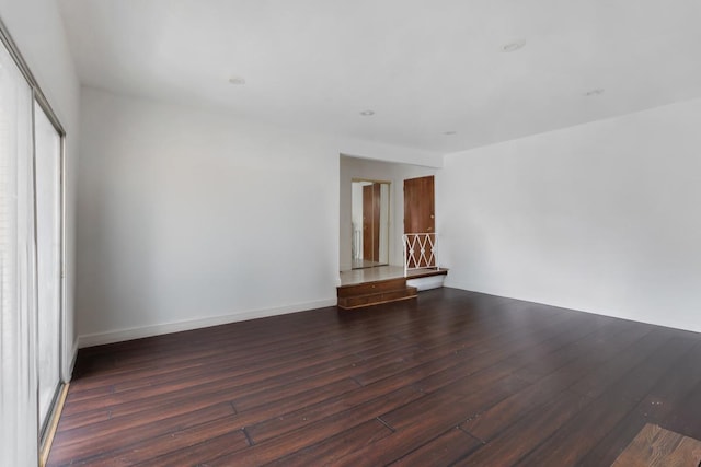 5251 W Galitz St Unit 311, Skokie, IL 60077 - unfurnished room with dark wood-style floors and baseboards
