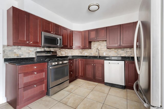 5251 W Galitz St Unit 311, Skokie, IL 60077 - kitchen featuring stainless steel appliances, reddish brown cabinets, decorative backsplash, and light tile patterned floors