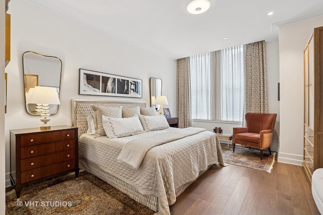 435 N Michigan Ave Unit 1203, Chicago, IL 60611 - bedroom featuring crown molding and wood finished floors