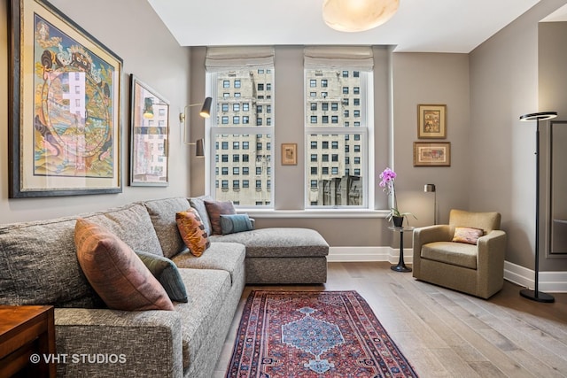 435 N Michigan Ave Unit 1203, Chicago, IL 60611 - living room featuring wood finished floors and baseboards