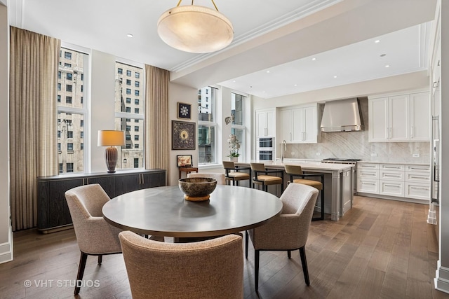 435 N Michigan Ave Unit 1203, Chicago, IL 60611 - dining area with wood-type flooring, ornamental molding, and recessed lighting