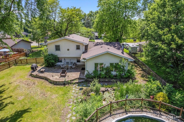 1920 Heather Ln, Joliet, IL 60431 - rear view of house featuring a patio area and a fenced backyard