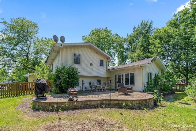 1920 Heather Ln, Joliet, IL 60431 - rear view of house with a fire pit and a patio