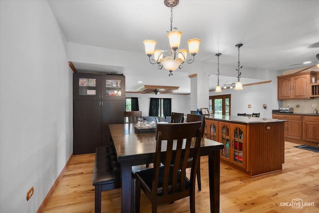 1920 Heather Ln, Joliet, IL 60431 - dining room featuring a ceiling fan, a chandelier, and light wood-type flooring