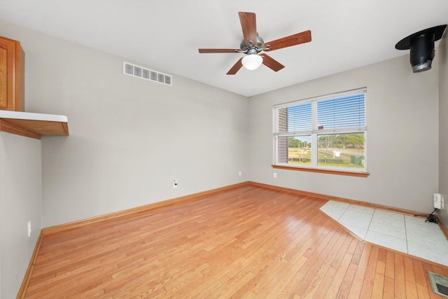 1225 Alexandria Dr, Sycamore, IL 60178 - unfurnished room featuring light wood-style floors and a ceiling fan