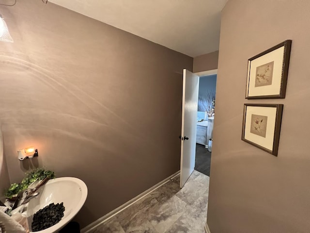 bathroom with baseboards