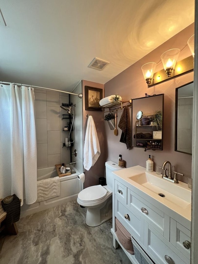 full bath featuring vanity and shower / bath combo