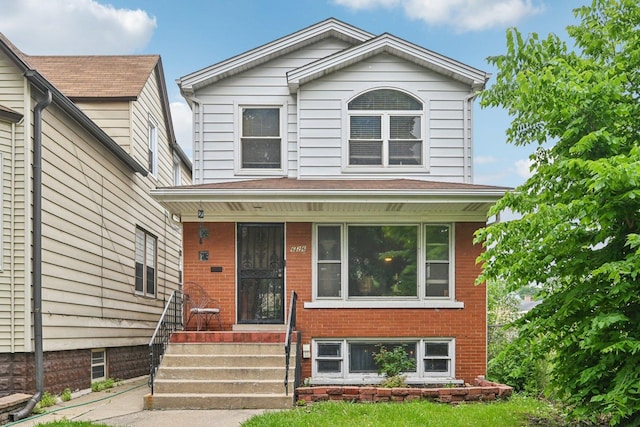 626 E 90th St, Chicago, IL 60619 - view of front of home with a porch and brick siding