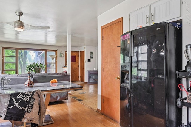 626 E 90th St, Chicago, IL 60619 - living room featuring light wood-style floors and ceiling fan