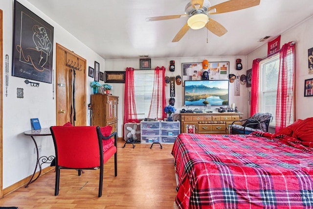 626 E 90th St, Chicago, IL 60619 - bedroom with wood finished floors and ceiling fan