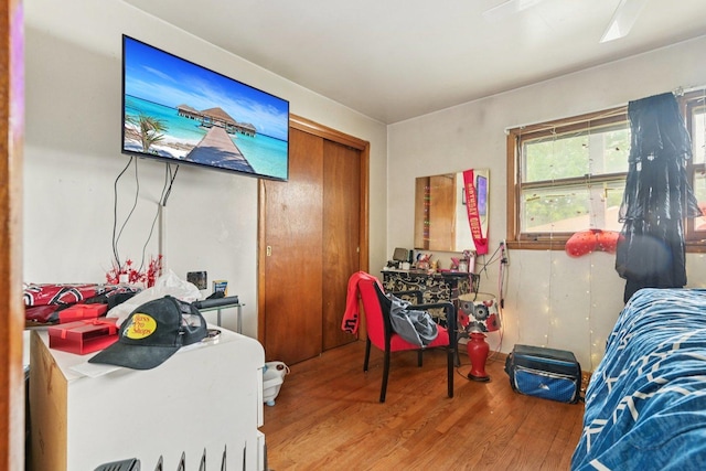 626 E 90th St, Chicago, IL 60619 - bedroom featuring wood finished floors and a closet
