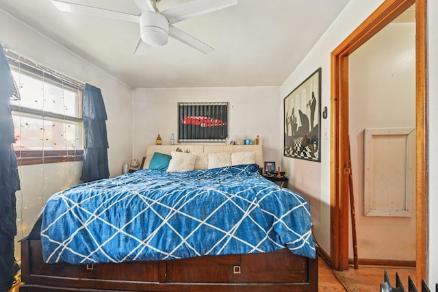 626 E 90th St, Chicago, IL 60619 - bedroom with wood finished floors and a ceiling fan