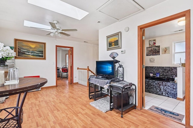 626 E 90th St, Chicago, IL 60619 - living room featuring wood finished floors and a ceiling fan