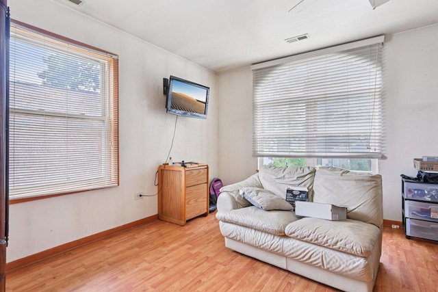 626 E 90th St, Chicago, IL 60619 - living area with light wood-style floors and baseboards