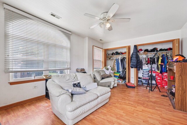 626 E 90th St, Chicago, IL 60619 - living room featuring wood finished floors and ceiling fan