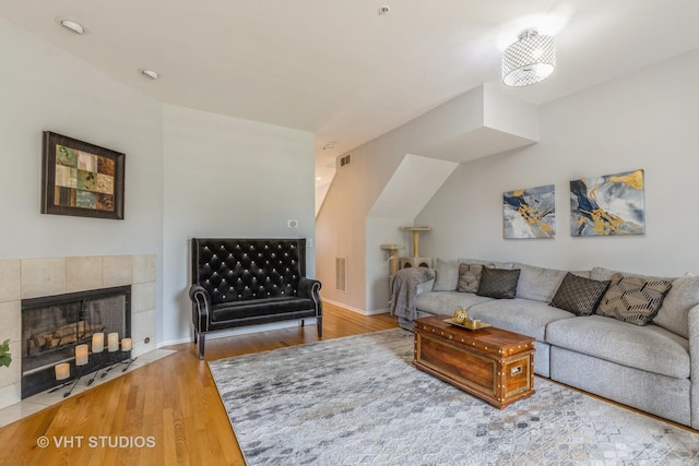 49 W 15th St Unit D, Chicago, IL 60605 - living room featuring wood finished floors and a tile fireplace