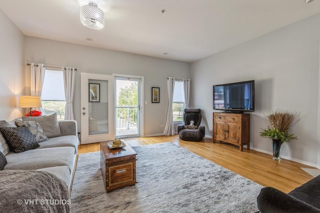 49 W 15th St Unit D, Chicago, IL 60605 - living room featuring wood finished floors and baseboards
