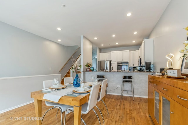 49 W 15th St Unit D, Chicago, IL 60605 - dining area with stairs, light wood finished floors, and recessed lighting