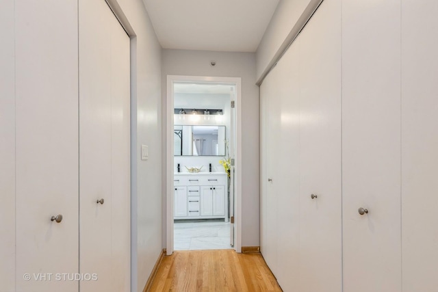 49 W 15th St Unit D, Chicago, IL 60605 - hallway featuring light wood finished floors and baseboards