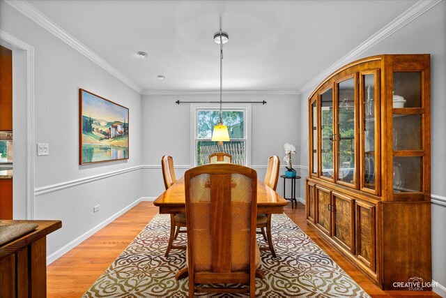 6382 Twin Oaks Ln, Lisle, IL 60532 - dining space with light wood-type flooring and ornamental molding