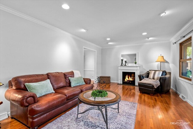 6382 Twin Oaks Ln, Lisle, IL 60532 - living area featuring a brick fireplace, hardwood / wood-style floors, crown molding, and recessed lighting