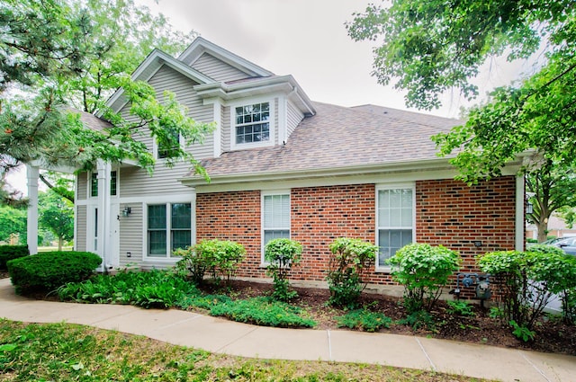 2015 N Silver Lake Rd Unit 1, Arlington Heights, IL 60004 - traditional home featuring brick siding and roof with shingles