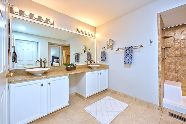 2015 N Silver Lake Rd Unit 1, Arlington Heights, IL 60004 - bathroom with tile patterned floors, double vanity, and tiled shower