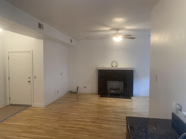 5940 S King Dr Unit 4W, Chicago, IL 60637 - living area with ceiling fan and light wood-style flooring