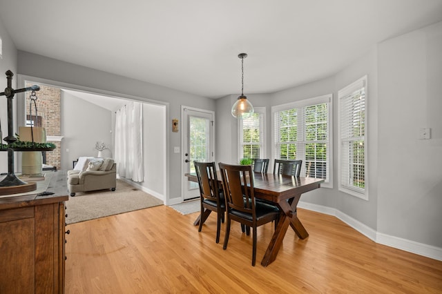 1826 Joseph Sixbury St, Sycamore, IL 60178 - dining space featuring light wood-style flooring and plenty of natural light
