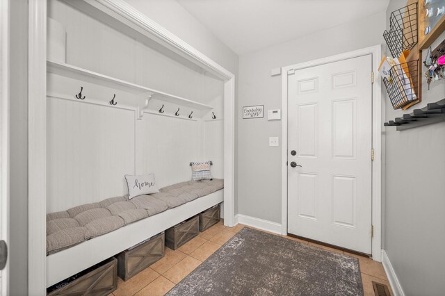 1826 Joseph Sixbury St, Sycamore, IL 60178 - mudroom with tile patterned flooring and baseboards