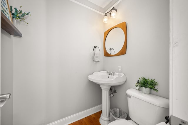 1826 Joseph Sixbury St, Sycamore, IL 60178 - bathroom featuring wood finished floors and ornamental molding