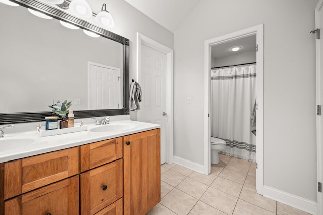 1826 Joseph Sixbury St, Sycamore, IL 60178 - bathroom featuring double vanity, tile patterned flooring, curtained shower, and lofted ceiling