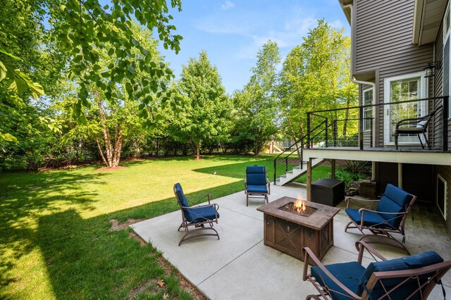 1826 Joseph Sixbury St, Sycamore, IL 60178 - view of patio featuring a fire pit, stairs, and view of scattered trees