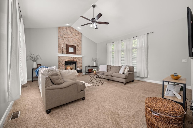 1826 Joseph Sixbury St, Sycamore, IL 60178 - living room with ceiling fan, carpet floors, a brick fireplace, and high vaulted ceiling