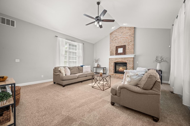 1826 Joseph Sixbury St, Sycamore, IL 60178 - carpeted living room featuring a ceiling fan, vaulted ceiling, and a fireplace