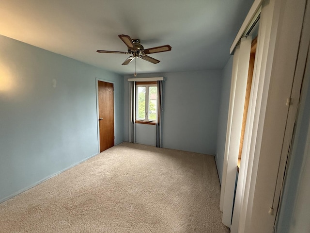 215 Krotiak Rd, Park Forest, IL 60466 - spare room featuring carpet and a ceiling fan