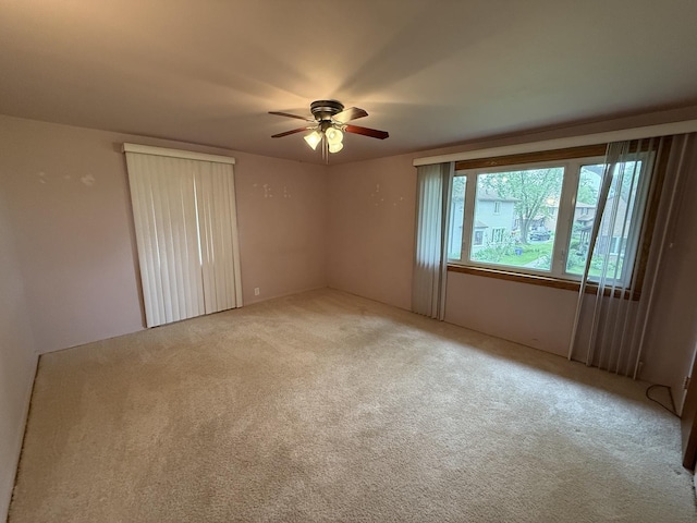 215 Krotiak Rd, Park Forest, IL 60466 - carpeted empty room with ceiling fan