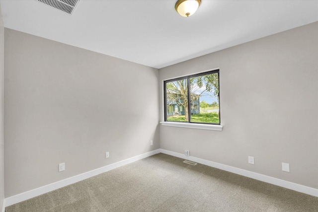 2553 Clayton Blvd Unit 2553, Champaign, IL 61822 - spare room featuring baseboards and carpet