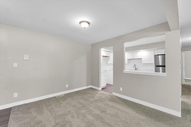 2553 Clayton Blvd Unit 2553, Champaign, IL 61822 - unfurnished living room featuring carpet floors