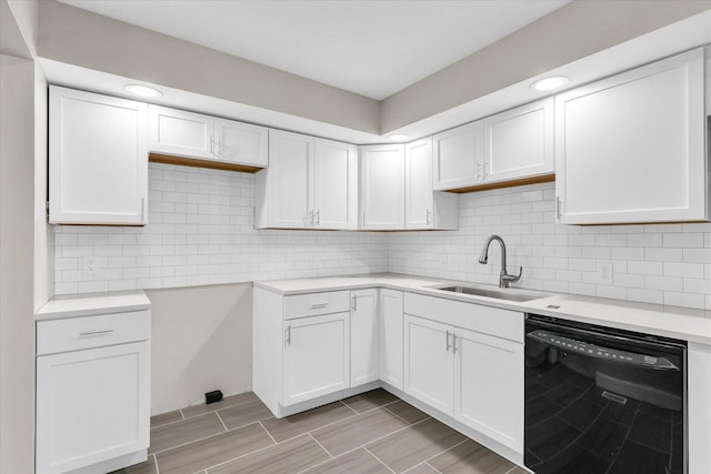 2553 Clayton Blvd Unit 2553, Champaign, IL 61822 - kitchen featuring black dishwasher, white cabinets, light countertops, tasteful backsplash, and wood finish floors